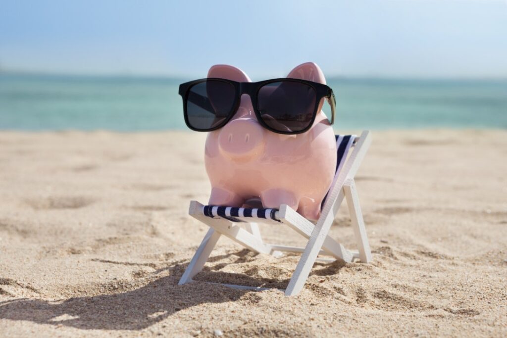 Pig Wearing Black Glasses On The Beach